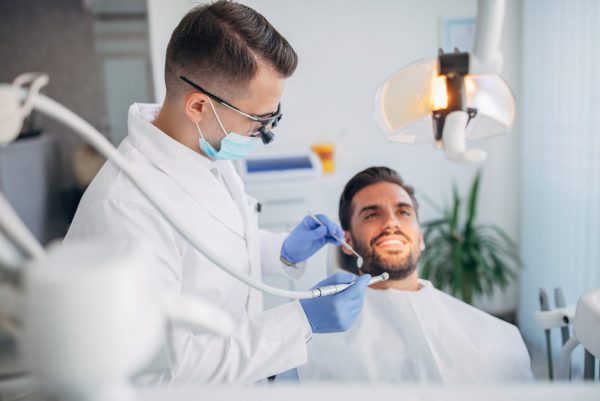 cambridge dentist performing dental implant treatment